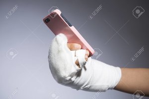 49348010-hands-are-bandaged-with-a-smartphone.jpg